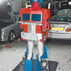 Illustration for article titled Real-Life Transforming Optimus Prime Costume